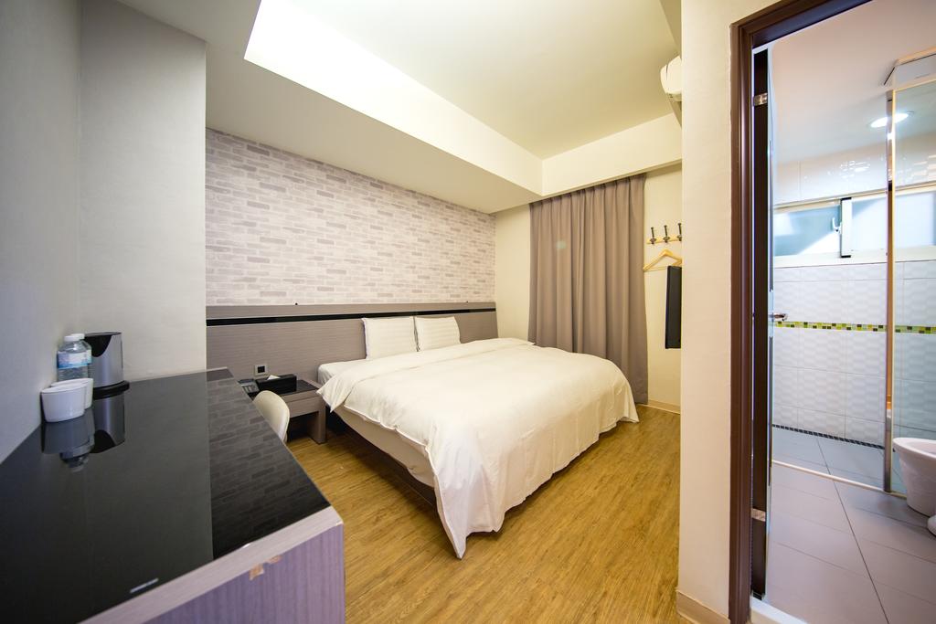 黃埔75旅店高級加大雙人床房